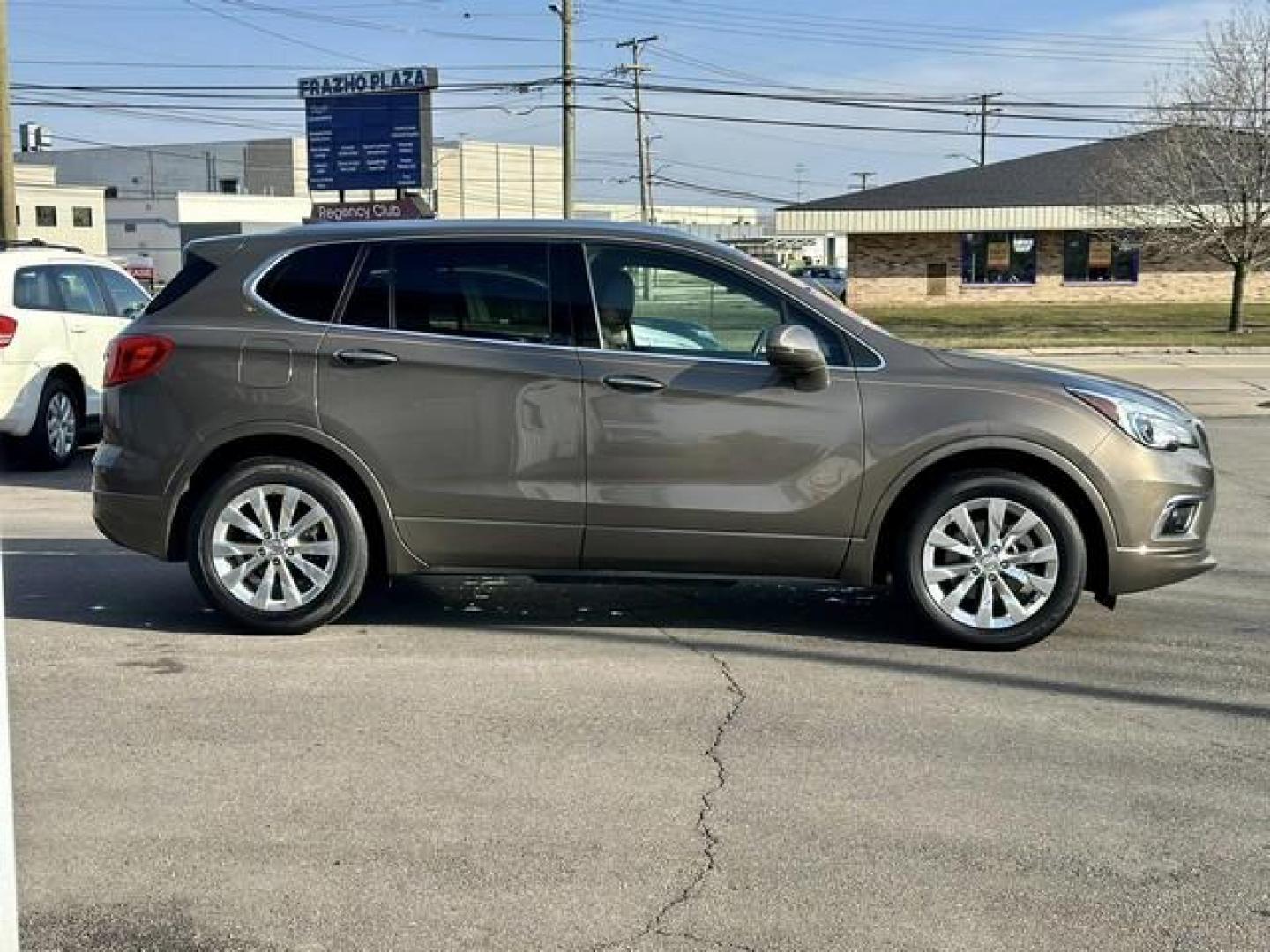 2018 BROWN BUICK ENVISION (LRBFX1SA7JD) with an L4,2.5L(153 CID),DOHC engine, AUTOMATIC transmission, located at 14600 Frazho Road, Warren, MI, 48089, (586) 776-3400, 42.485996, -82.974220 - Photo#4