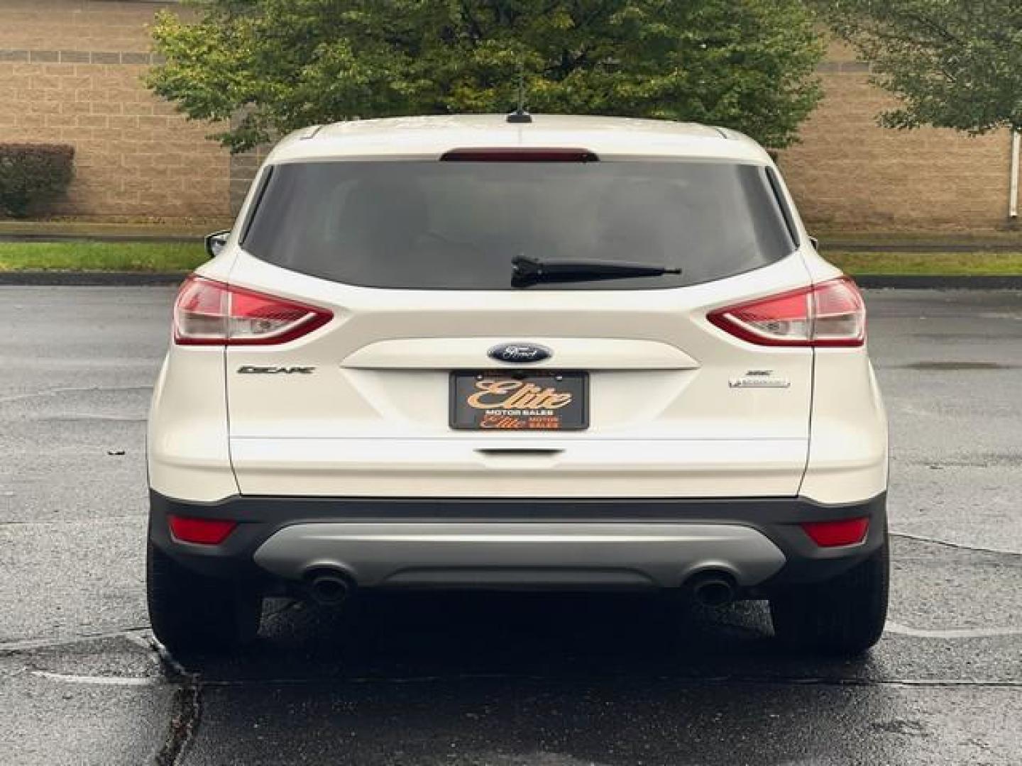 2014 WHITE FORD ESCAPE (1FMCU0GXXEU) with an L4,1.6L(97 CID),DOHC engine, AUTOMATIC transmission, located at 14600 Frazho Road, Warren, MI, 48089, (586) 776-3400, 42.485996, -82.974220 - Photo#6