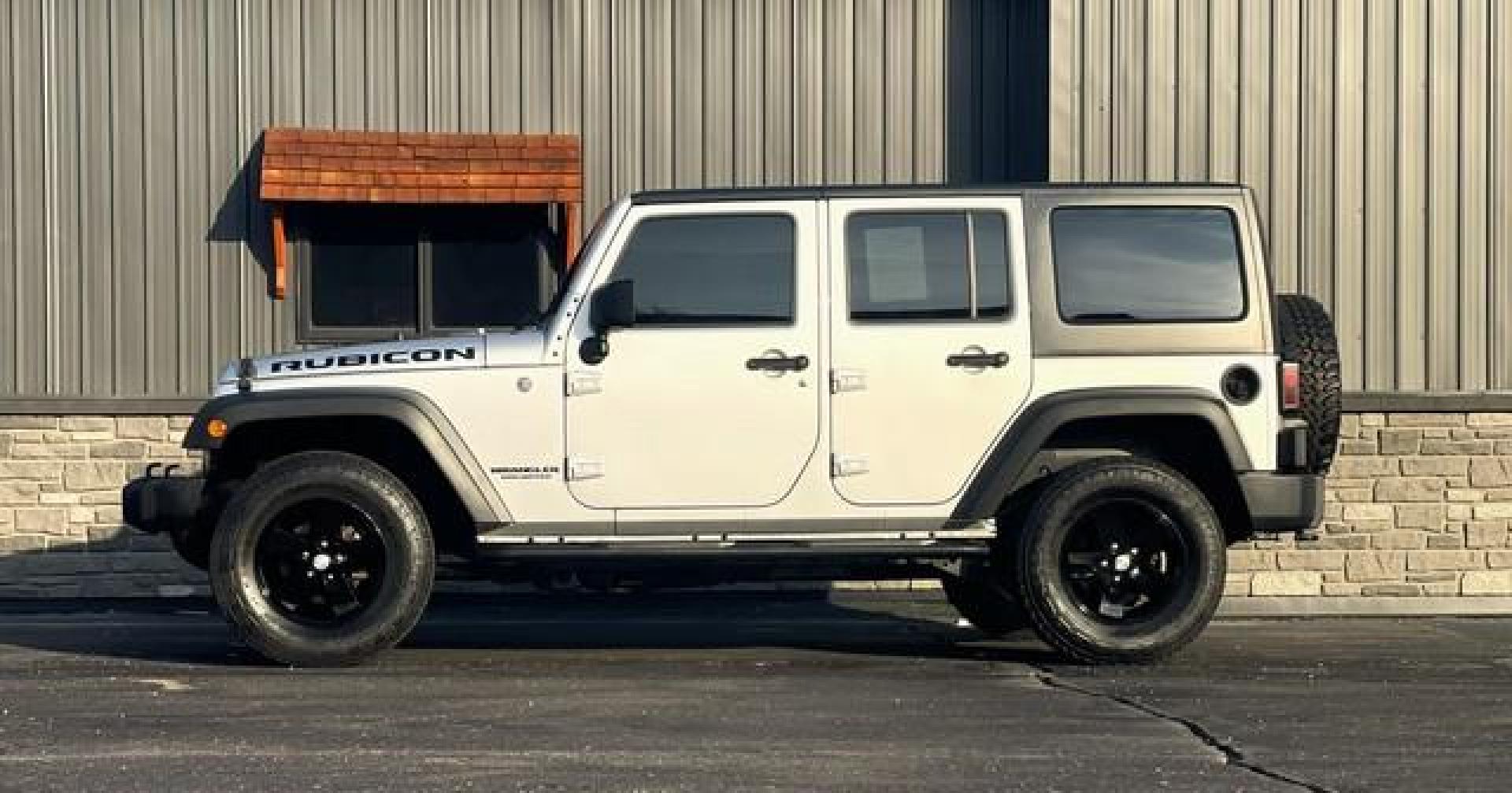 2012 SILVER JEEP WRANGLER (1C4HJWFG7CL) with an V6,3.6L(220 CID),DOHC engine, AUTOMATIC transmission, located at 14600 Frazho Road, Warren, MI, 48089, (586) 776-3400, 42.485996, -82.974220 - Photo#0