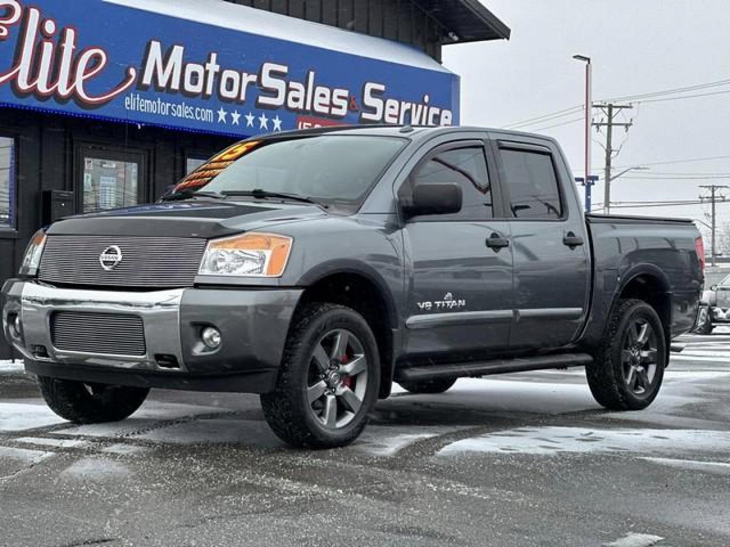 2015 GREY NISSAN TITAN (1N6AA0EC0FN) with an V8,5.6L(339 CID),DOHC engine, AUTOMATIC transmission, located at 14600 Frazho Road, Warren, MI, 48089, (586) 776-3400, 42.485996, -82.974220 - Photo#0