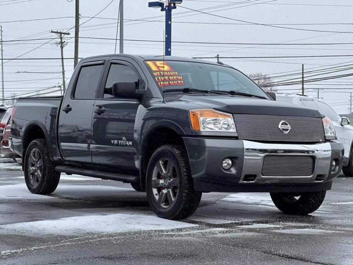 2015 GREY NISSAN TITAN (1N6AA0EC0FN) with an V8,5.6L(339 CID),DOHC engine, AUTOMATIC transmission, located at 14600 Frazho Road, Warren, MI, 48089, (586) 776-3400, 42.485996, -82.974220 - Photo#2