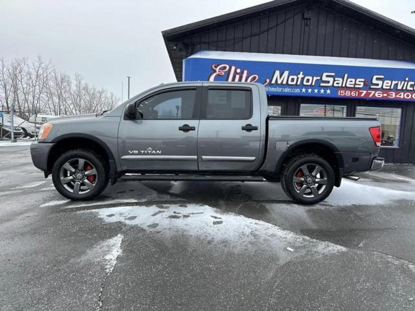 2015 GREY NISSAN TITAN (1N6AA0EC0FN) with an V8,5.6L(339 CID),DOHC engine, AUTOMATIC transmission, located at 14600 Frazho Road, Warren, MI, 48089, (586) 776-3400, 42.485996, -82.974220 - Photo#7