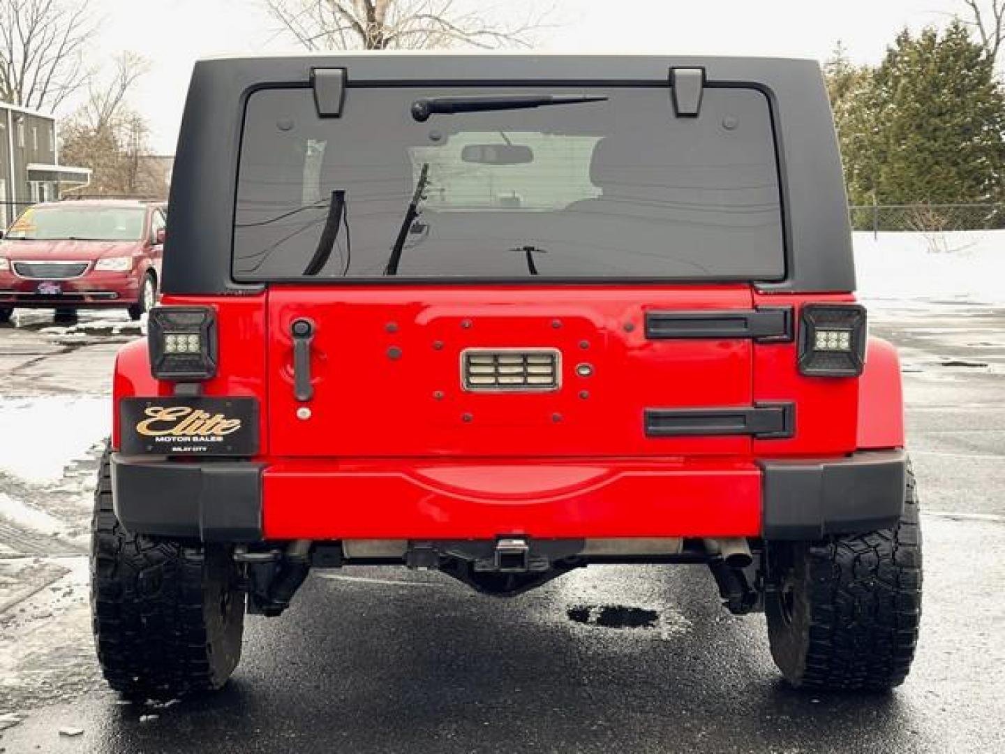 2016 RED JEEP WRANGLER (1C4BJWEG3GL) with an V6,3.6L(220 CID),DOHC engine, AUTOMATIC transmission, located at 14600 Frazho Road, Warren, MI, 48089, (586) 776-3400, 42.485996, -82.974220 - Photo#6