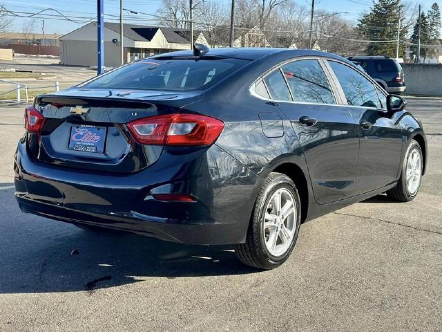 2017 BLACK CHEVROLET CRUZE (1G1BE5SM7H7) with an L4,1.4L(85 CID),DOHC engine, AUTOMATIC transmission, located at 14600 Frazho Road, Warren, MI, 48089, (586) 776-3400, 42.485996, -82.974220 - Photo#4