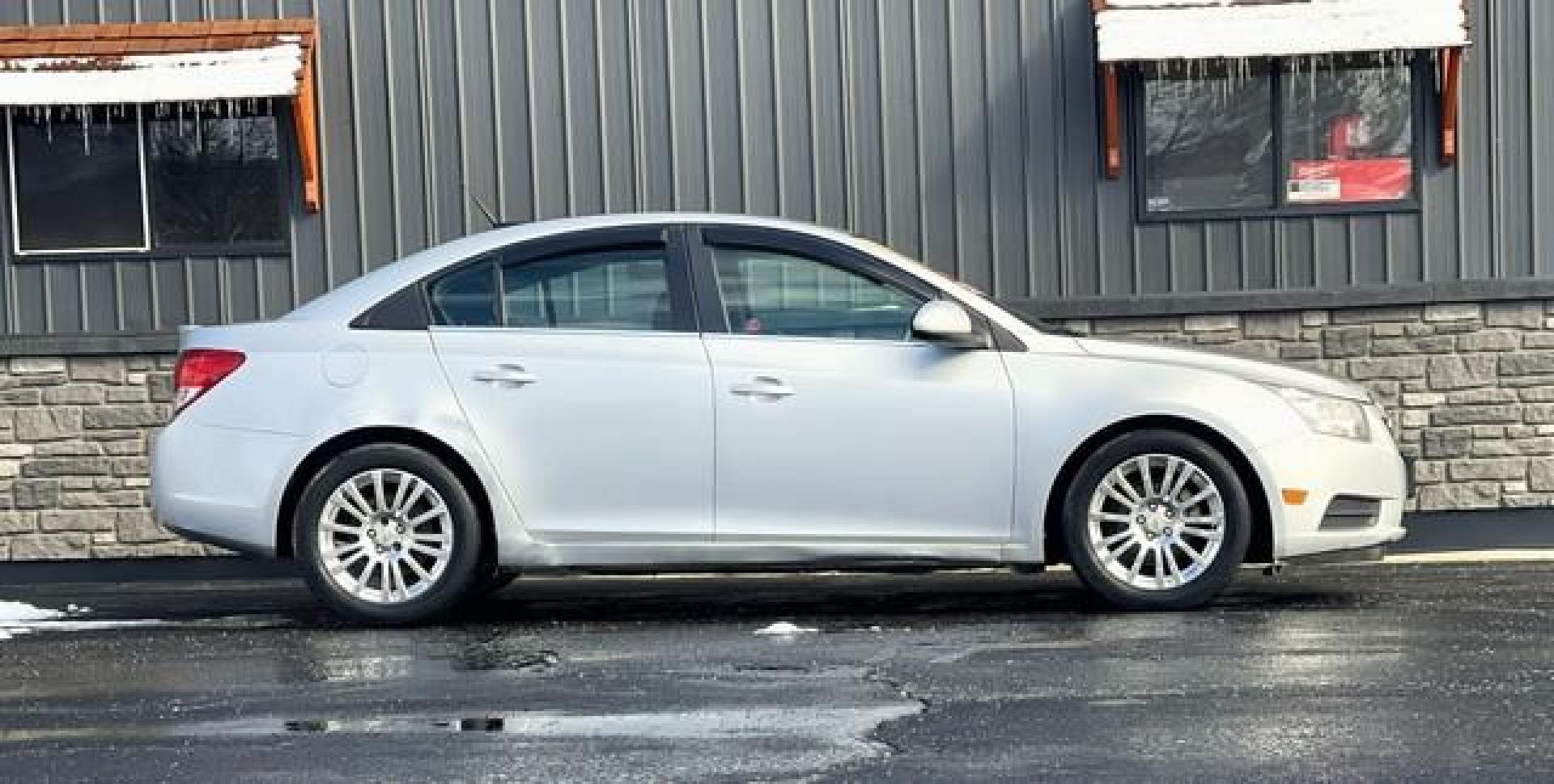 2011 SILVER CHEVROLET CRUZE (1G1PK5S9XB7) with an L4,1.4L(83 CID),DOHC engine, MANUAL transmission, located at 14600 Frazho Road, Warren, MI, 48089, (586) 776-3400, 42.485996, -82.974220 - Photo#3