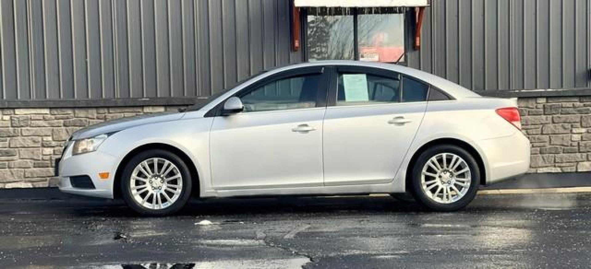 2011 SILVER CHEVROLET CRUZE (1G1PK5S9XB7) with an L4,1.4L(83 CID),DOHC engine, MANUAL transmission, located at 14600 Frazho Road, Warren, MI, 48089, (586) 776-3400, 42.485996, -82.974220 - Photo#5