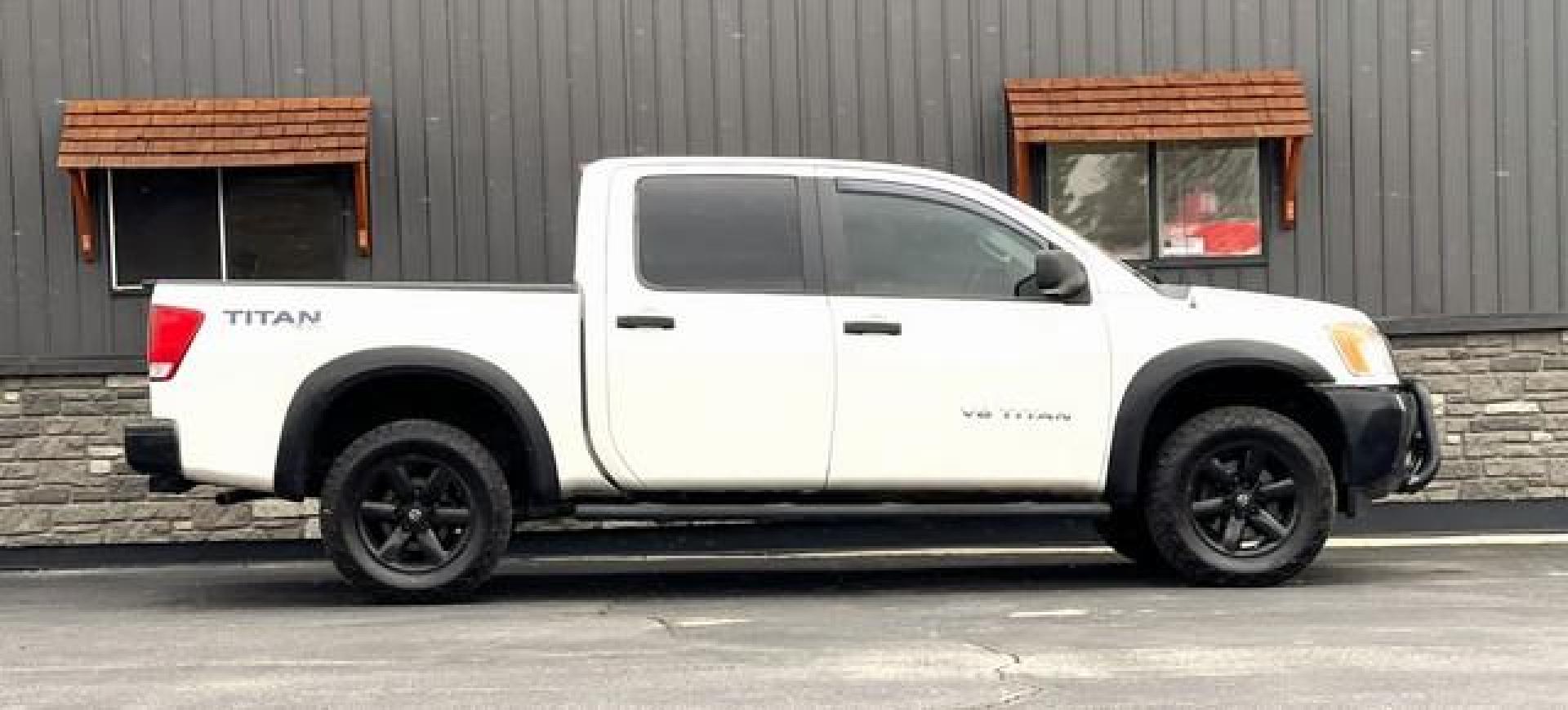 2014 WHITE NISSAN TITAN (1N6AA0EJ7EN) with an V8,5.6L(339 CID),DOHC engine, AUTOMATIC transmission, located at 14600 Frazho Road, Warren, MI, 48089, (586) 776-3400, 42.485996, -82.974220 - Photo#2