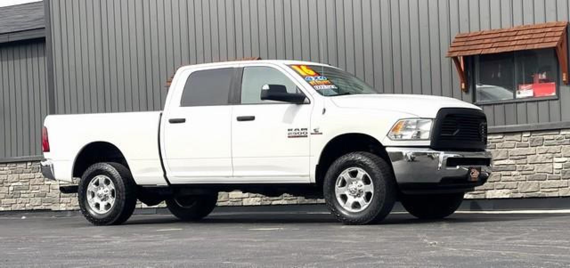 2016 WHITE RAM 2500 (3C6UR5DL4GG) with an L6,6.7L(408 CID),OHV engine, AUTOMATIC transmission, located at 14600 Frazho Road, Warren, MI, 48089, (586) 776-3400, 42.485996, -82.974220 - Photo#2