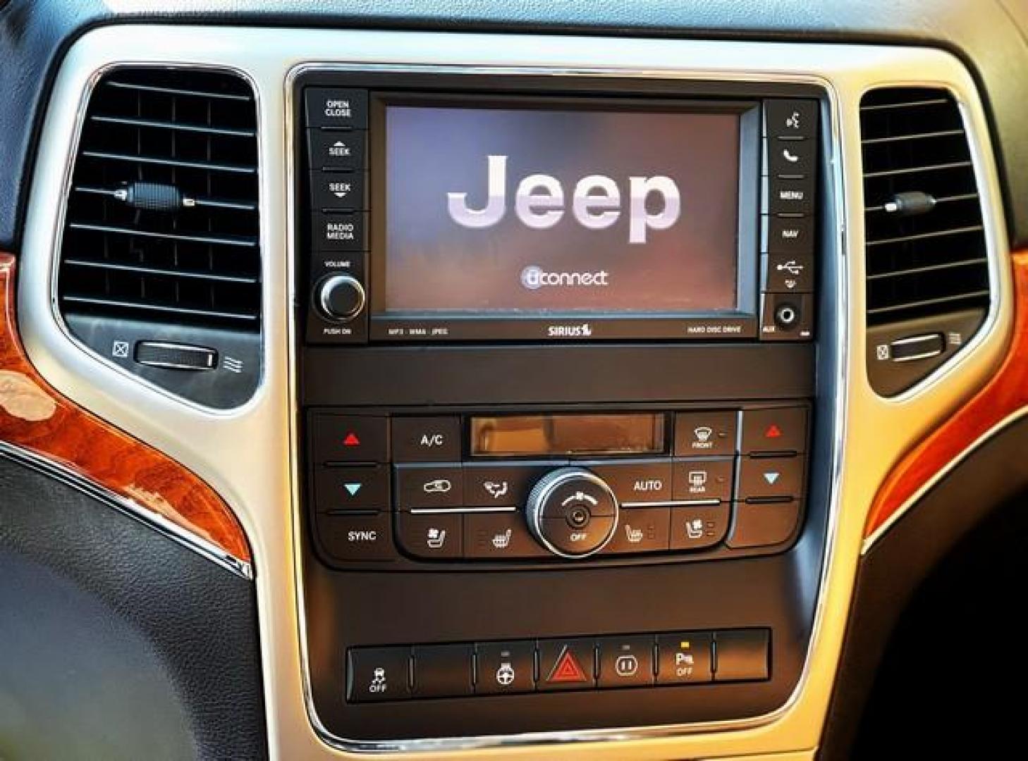 2012 BLACK JEEP GRAND CHEROKEE (1C4RJFCG9CC) with an V6,3.6L(220 CID),DOHC engine, AUTOMATIC transmission, located at 14600 Frazho Road, Warren, MI, 48089, (586) 776-3400, 42.485996, -82.974220 - Photo#11