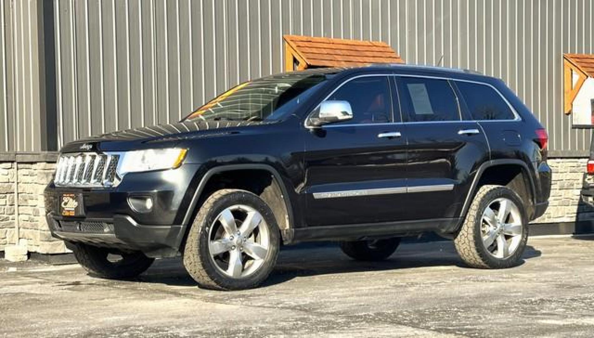 2012 BLACK JEEP GRAND CHEROKEE (1C4RJFCG9CC) with an V6,3.6L(220 CID),DOHC engine, AUTOMATIC transmission, located at 14600 Frazho Road, Warren, MI, 48089, (586) 776-3400, 42.485996, -82.974220 - Photo#1