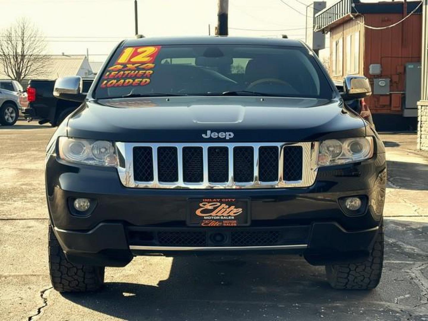 2012 BLACK JEEP GRAND CHEROKEE (1C4RJFCG9CC) with an V6,3.6L(220 CID),DOHC engine, AUTOMATIC transmission, located at 14600 Frazho Road, Warren, MI, 48089, (586) 776-3400, 42.485996, -82.974220 - Photo#2