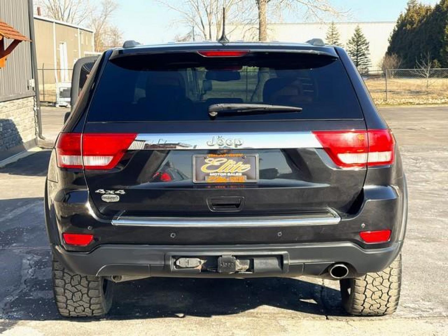 2012 BLACK JEEP GRAND CHEROKEE (1C4RJFCG9CC) with an V6,3.6L(220 CID),DOHC engine, AUTOMATIC transmission, located at 14600 Frazho Road, Warren, MI, 48089, (586) 776-3400, 42.485996, -82.974220 - Photo#5