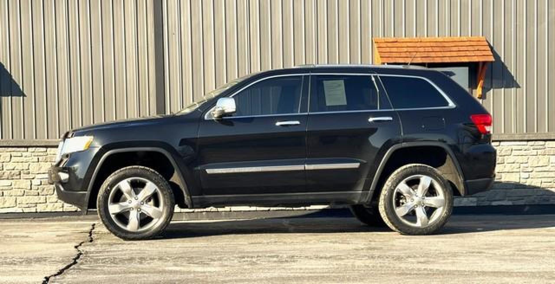 2012 BLACK JEEP GRAND CHEROKEE (1C4RJFCG9CC) with an V6,3.6L(220 CID),DOHC engine, AUTOMATIC transmission, located at 14600 Frazho Road, Warren, MI, 48089, (586) 776-3400, 42.485996, -82.974220 - Photo#6