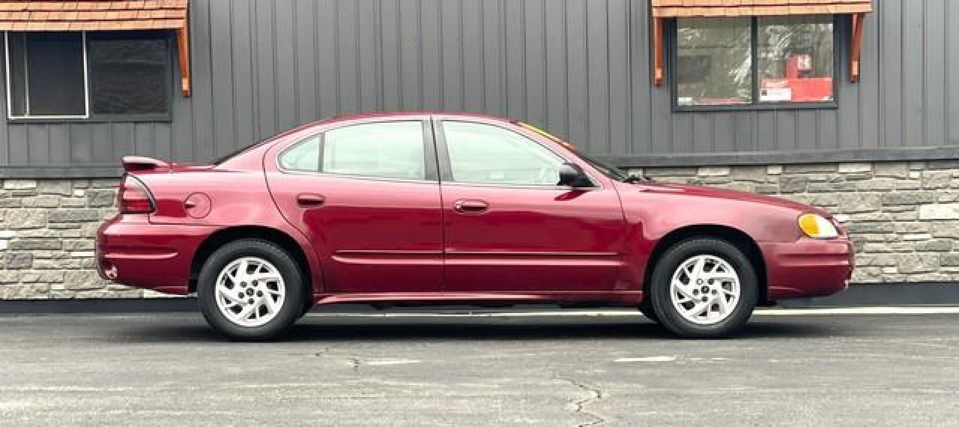 2004 BURGUNDY PONTIAC GRAND AM (1G2NE52F44C) with an L4,2.2L(134 CID),DOHC engine, AUTOMATIC transmission, located at 14600 Frazho Road, Warren, MI, 48089, (586) 776-3400, 42.485996, -82.974220 - Photo#1