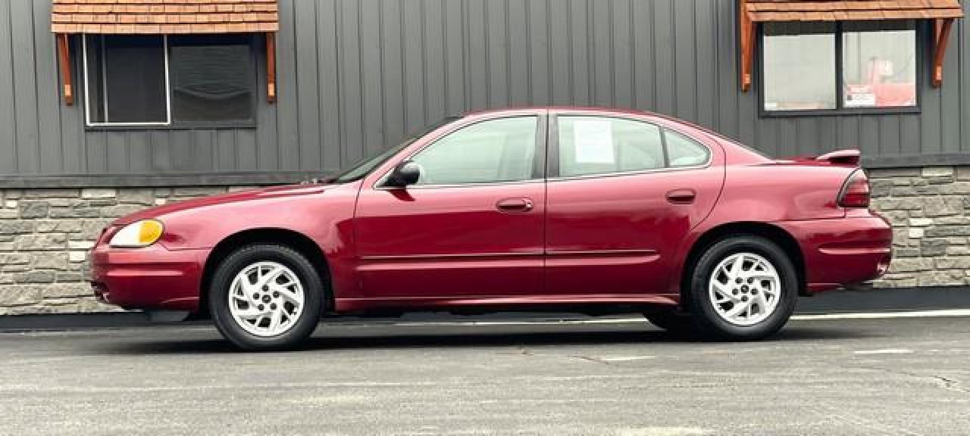 2004 BURGUNDY PONTIAC GRAND AM (1G2NE52F44C) with an L4,2.2L(134 CID),DOHC engine, AUTOMATIC transmission, located at 14600 Frazho Road, Warren, MI, 48089, (586) 776-3400, 42.485996, -82.974220 - Photo#5