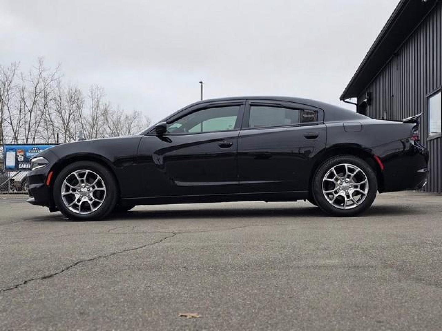 2016 BLACK DODGE CHARGER (2C3CDXJG7GH) with an V6,3.6L(220 CID),DOHC engine, AUTOMATIC transmission, located at 14600 Frazho Road, Warren, MI, 48089, (586) 776-3400, 42.485996, -82.974220 - Photo#7