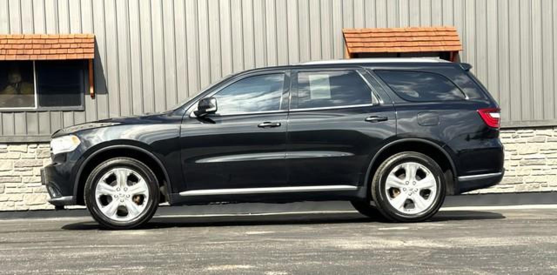 2015 BLACK DODGE DURANGO (1C4RDJDG7FC) with an V6,3.6L(220 CID),DOHC engine, AUTOMATIC transmission, located at 14600 Frazho Road, Warren, MI, 48089, (586) 776-3400, 42.485996, -82.974220 - Photo#4