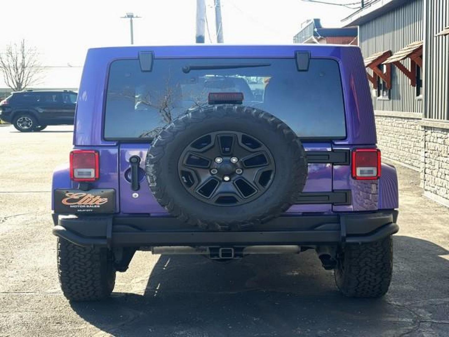 2016 XTREME PURPLE PEARL JEEP WRANGLER (1C4BJWEG4GL) with an V6,3.6L(220 CID),DOHC engine, AUTOMATIC transmission, located at 14600 Frazho Road, Warren, MI, 48089, (586) 776-3400, 42.485996, -82.974220 - Photo#6