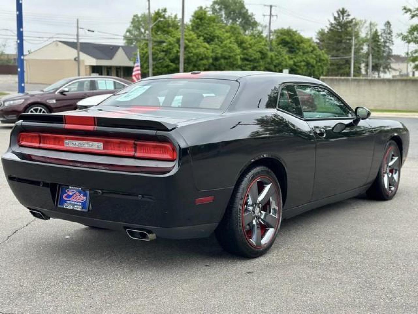 2013 BLACK DODGE CHALLENGER (2C3CDYAG6DH) with an V6,3.6L(220 CID),DOHC engine, AUTOMATIC transmission, located at 14600 Frazho Road, Warren, MI, 48089, (586) 776-3400, 42.485996, -82.974220 - Photo#4