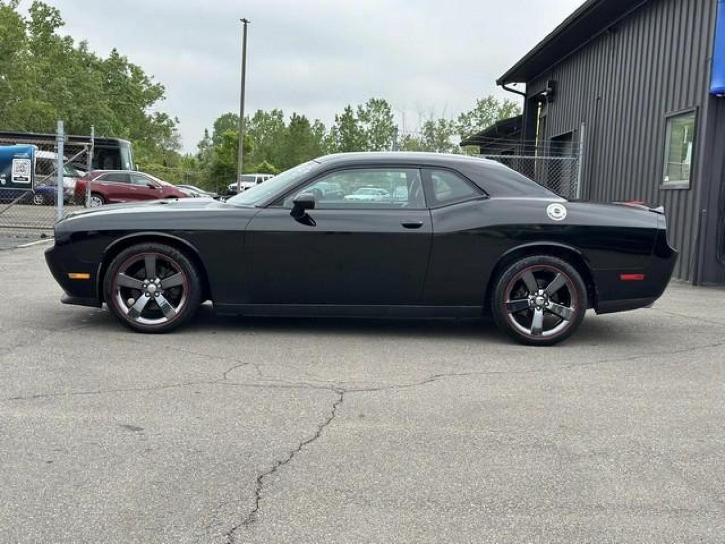 2013 BLACK DODGE CHALLENGER (2C3CDYAG6DH) with an V6,3.6L(220 CID),DOHC engine, AUTOMATIC transmission, located at 14600 Frazho Road, Warren, MI, 48089, (586) 776-3400, 42.485996, -82.974220 - Photo#6