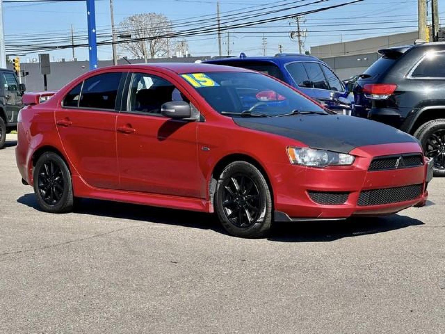 2015 RED MITSUBISHI LANCER (JA32U2FU7FU) with an L4,2.0L(122 CID),DOHC engine, AUTOMATIC transmission, located at 14600 Frazho Road, Warren, MI, 48089, (586) 776-3400, 42.485996, -82.974220 - Photo#2