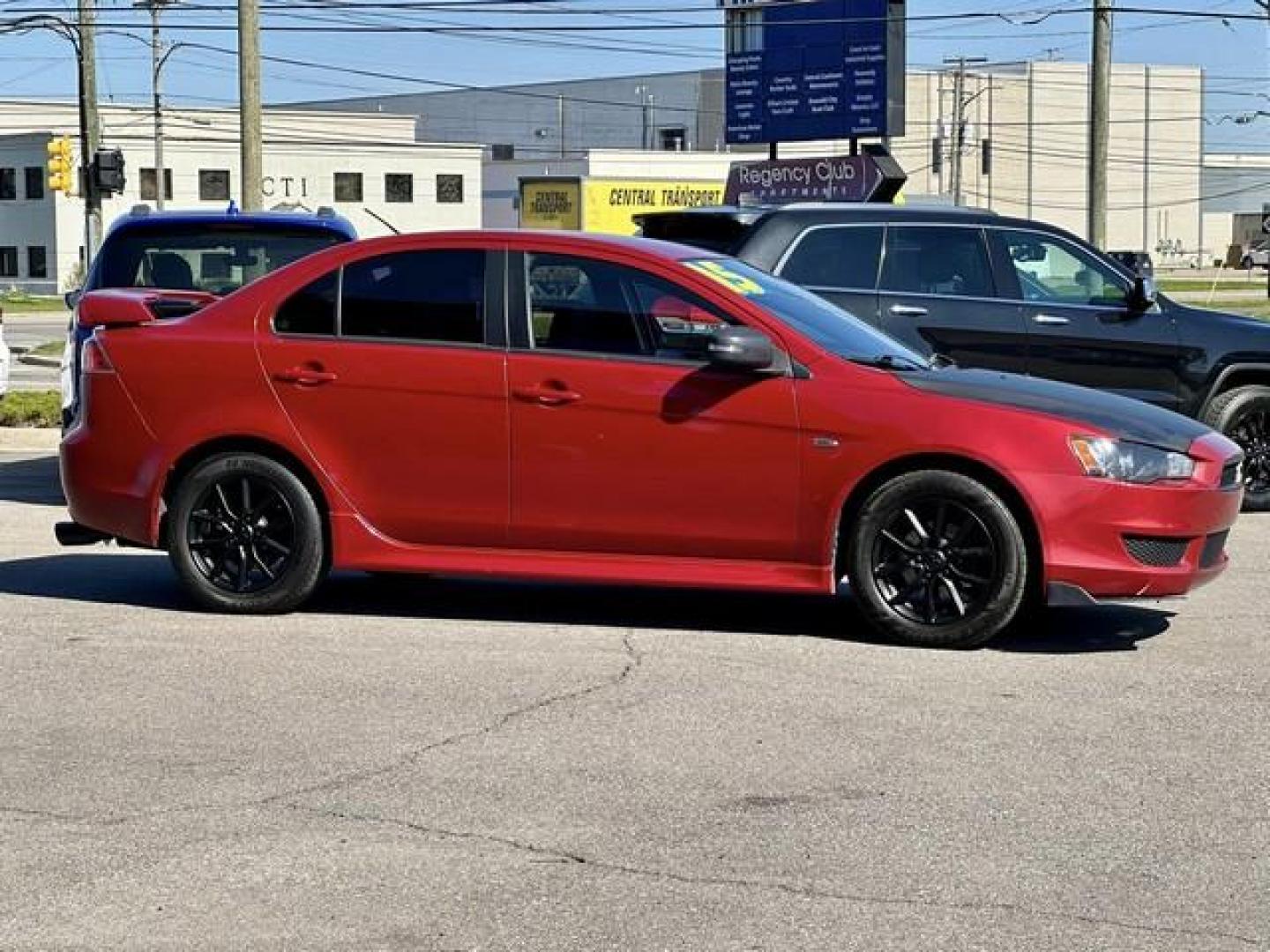 2015 RED MITSUBISHI LANCER (JA32U2FU7FU) with an L4,2.0L(122 CID),DOHC engine, AUTOMATIC transmission, located at 14600 Frazho Road, Warren, MI, 48089, (586) 776-3400, 42.485996, -82.974220 - Photo#3