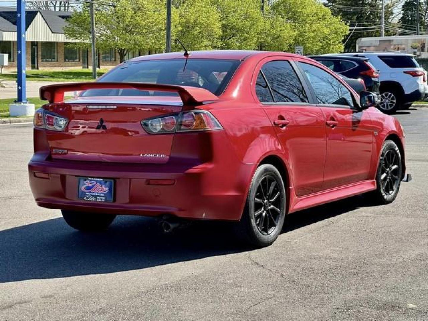 2015 RED MITSUBISHI LANCER (JA32U2FU7FU) with an L4,2.0L(122 CID),DOHC engine, AUTOMATIC transmission, located at 14600 Frazho Road, Warren, MI, 48089, (586) 776-3400, 42.485996, -82.974220 - Photo#5