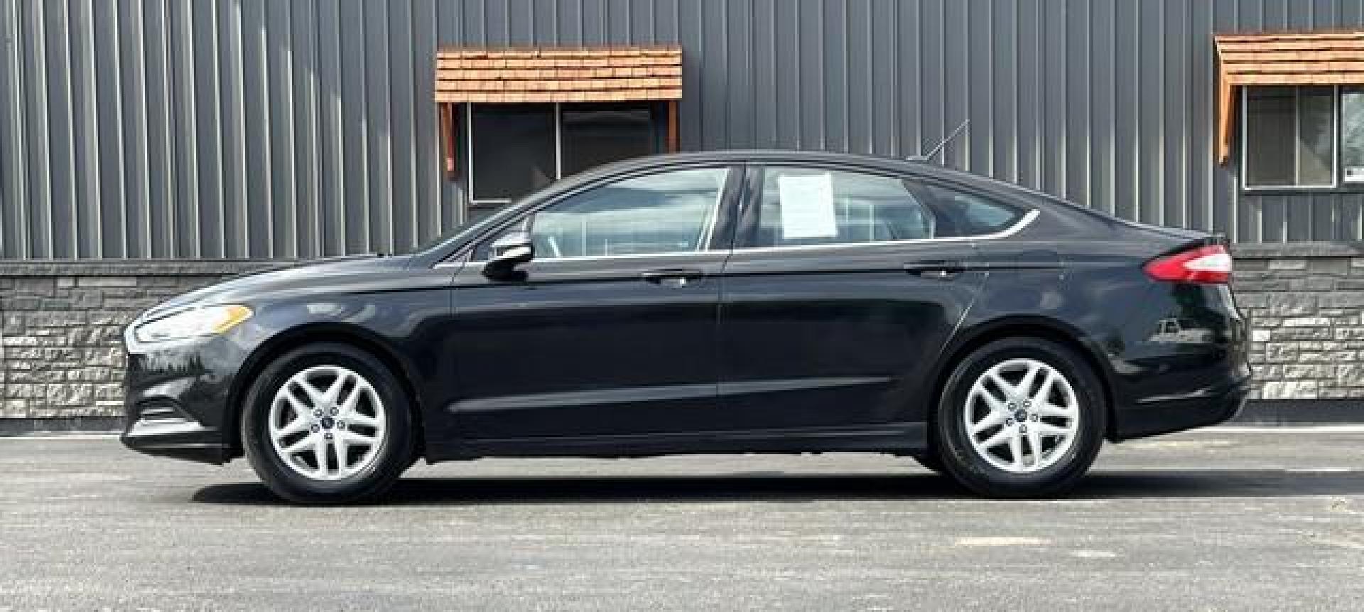 2015 BLACK FORD FUSION (1FA6P0H74F5) with an L4,2.5L(152 CID),DOHC engine, AUTOMATIC transmission, located at 14600 Frazho Road, Warren, MI, 48089, (586) 776-3400, 42.485996, -82.974220 - Photo#1