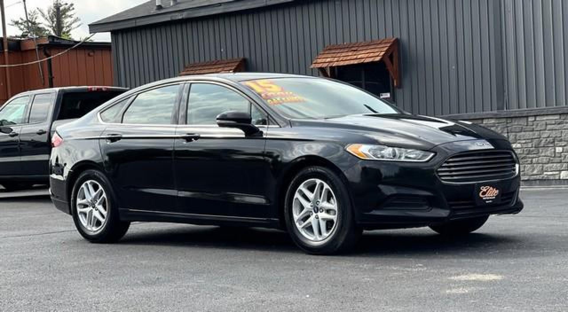 2015 BLACK FORD FUSION (1FA6P0H74F5) with an L4,2.5L(152 CID),DOHC engine, AUTOMATIC transmission, located at 14600 Frazho Road, Warren, MI, 48089, (586) 776-3400, 42.485996, -82.974220 - Photo#4