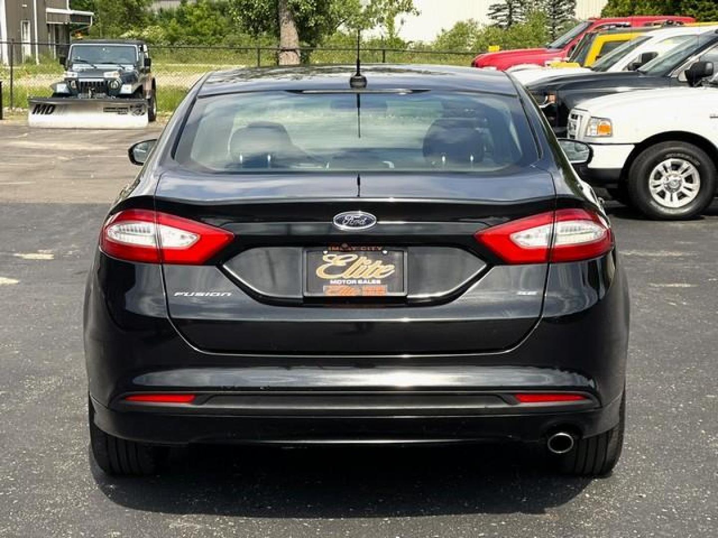 2015 BLACK FORD FUSION (1FA6P0H74F5) with an L4,2.5L(152 CID),DOHC engine, AUTOMATIC transmission, located at 14600 Frazho Road, Warren, MI, 48089, (586) 776-3400, 42.485996, -82.974220 - Photo#6