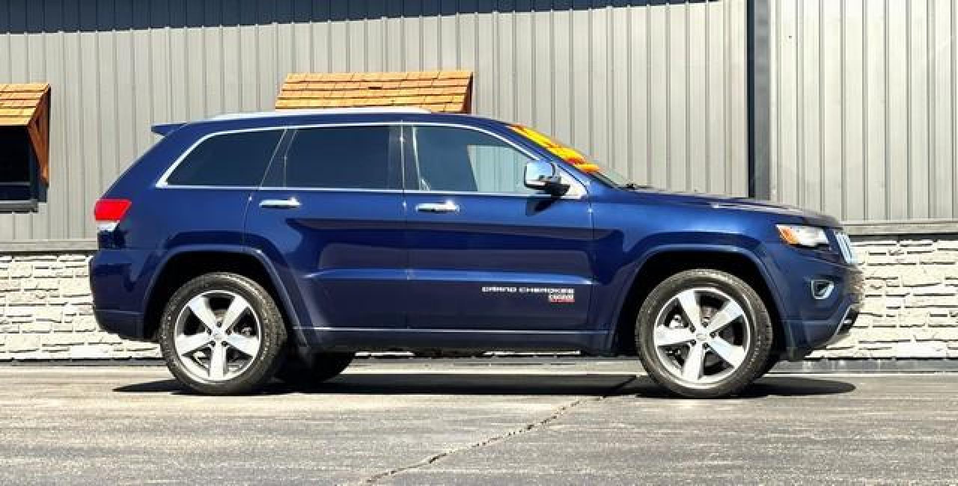 2014 BLUE JEEP GRAND CHEROKEE (1C4RJFCT0EC) with an V8,5.7L(345 CID),OHV engine, AUTOMATIC transmission, located at 14600 Frazho Road, Warren, MI, 48089, (586) 776-3400, 42.485996, -82.974220 - Photo#4