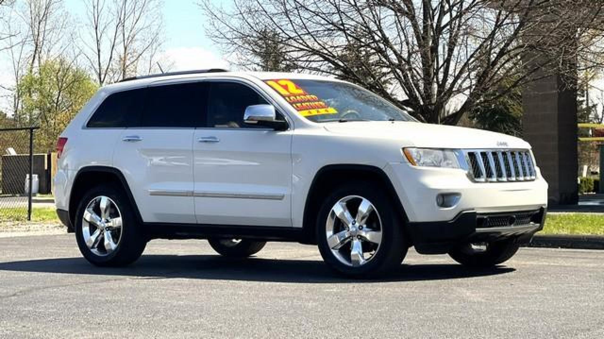 2012 WHITE JEEP GRAND CHEROKEE (1C4RJFCG7CC) with an V6,3.6L(220 CID),DOHC engine, AUTOMATIC transmission, located at 14600 Frazho Road, Warren, MI, 48089, (586) 776-3400, 42.485996, -82.974220 - Photo#1