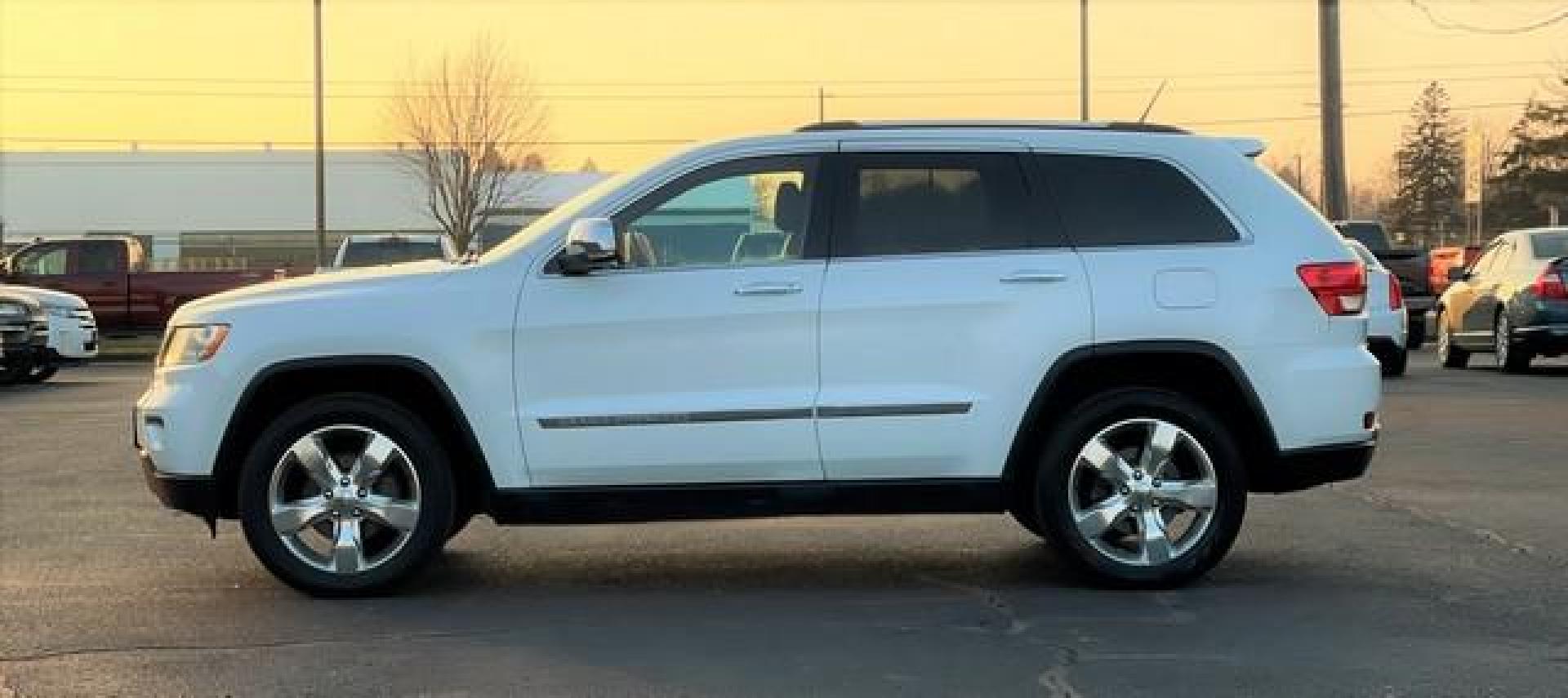 2012 WHITE JEEP GRAND CHEROKEE (1C4RJFCG7CC) with an V6,3.6L(220 CID),DOHC engine, AUTOMATIC transmission, located at 14600 Frazho Road, Warren, MI, 48089, (586) 776-3400, 42.485996, -82.974220 - Photo#3