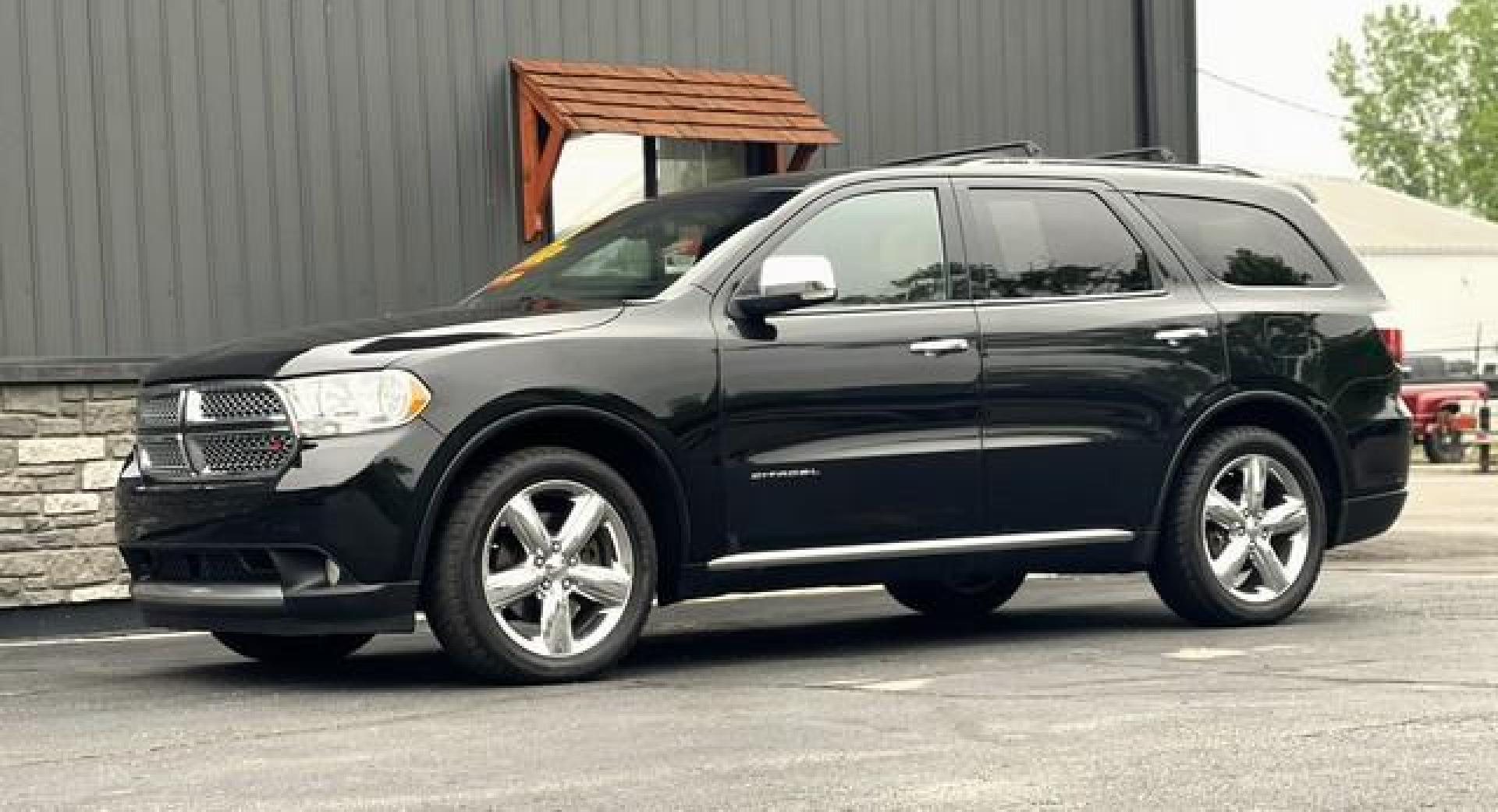 2011 BLACK DODGE DURANGO (1D4SE5GT9BC) with an V8,5.7L(345 CID),OHV engine, AUTOMATIC transmission, located at 14600 Frazho Road, Warren, MI, 48089, (586) 776-3400, 42.485996, -82.974220 - Photo#1