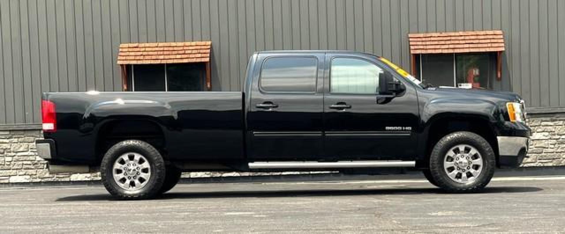 2012 BLACK GMC SIERRA 3500 HD (1GT424C85CF) with an V8,6.6L(403 CID),OHV engine, AUTOMATIC transmission, located at 14600 Frazho Road, Warren, MI, 48089, (586) 776-3400, 42.485996, -82.974220 - Photo#5