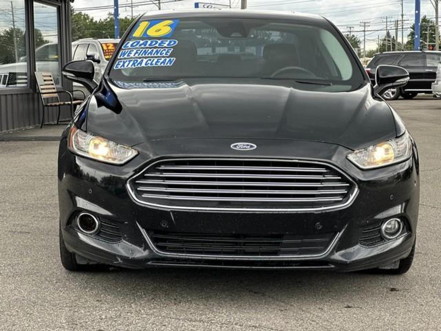 2016 BLACK FORD FUSION (3FA6P0D99GR) with an L4,2.0L(122 CID),DOHC engine, AUTOMATIC transmission, located at 14600 Frazho Road, Warren, MI, 48089, (586) 776-3400, 42.485996, -82.974220 - Photo#1