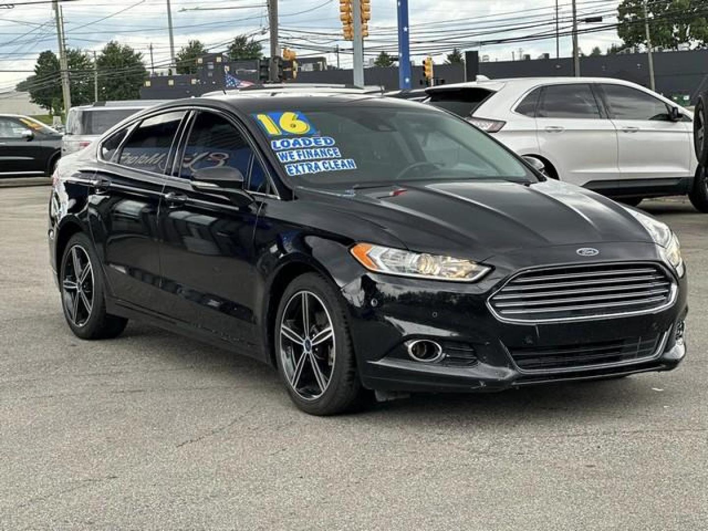 2016 BLACK FORD FUSION (3FA6P0D99GR) with an L4,2.0L(122 CID),DOHC engine, AUTOMATIC transmission, located at 14600 Frazho Road, Warren, MI, 48089, (586) 776-3400, 42.485996, -82.974220 - Photo#2