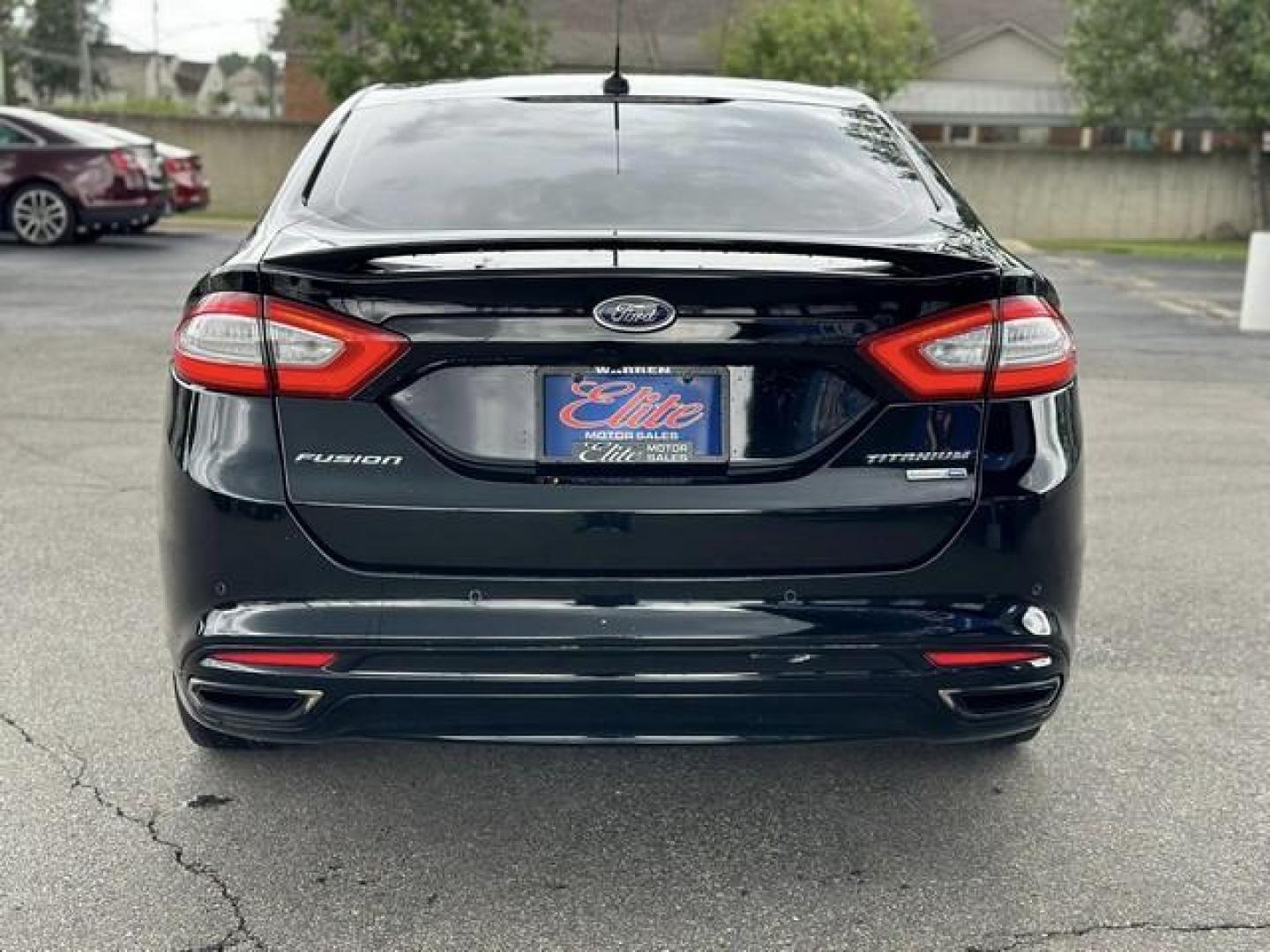 2016 BLACK FORD FUSION (3FA6P0D99GR) with an L4,2.0L(122 CID),DOHC engine, AUTOMATIC transmission, located at 14600 Frazho Road, Warren, MI, 48089, (586) 776-3400, 42.485996, -82.974220 - Photo#5