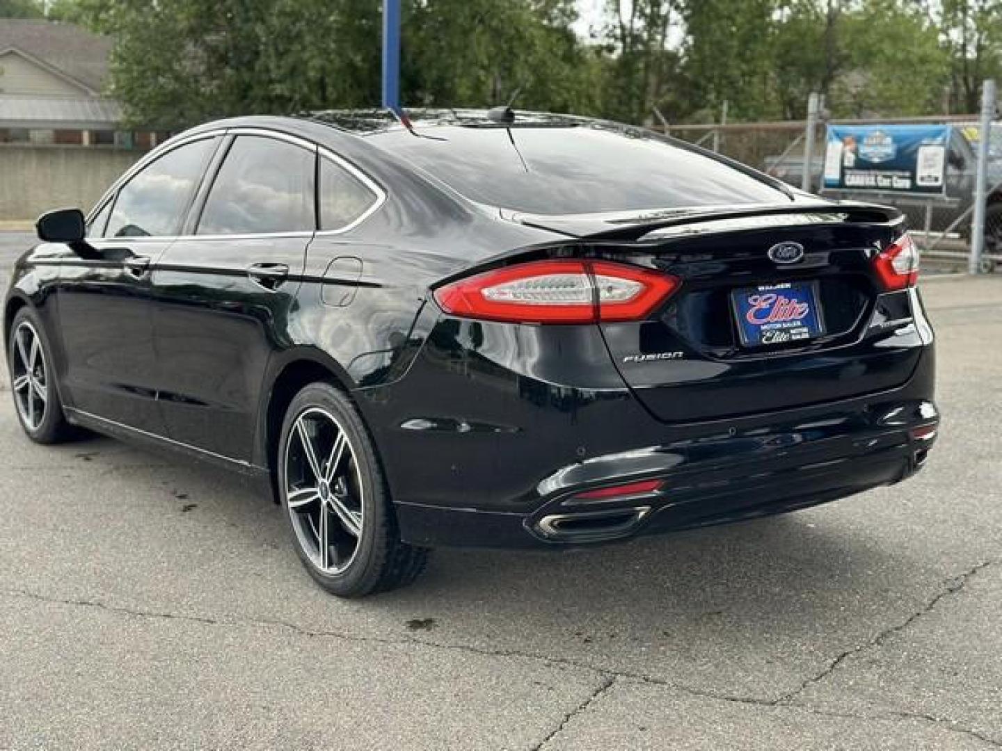 2016 BLACK FORD FUSION (3FA6P0D99GR) with an L4,2.0L(122 CID),DOHC engine, AUTOMATIC transmission, located at 14600 Frazho Road, Warren, MI, 48089, (586) 776-3400, 42.485996, -82.974220 - Photo#6