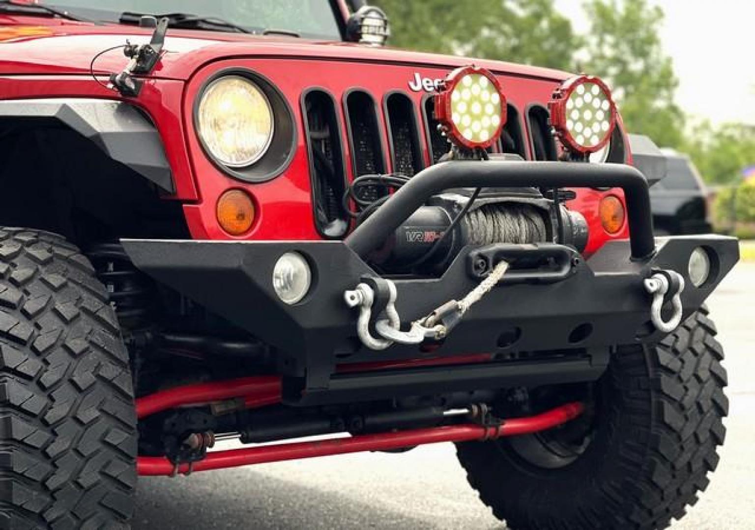 2009 RED JEEP WRANGLER (1J4GA39179L) with an V6,3.8L(231 CID),OHV engine, MANUAL transmission, located at 14600 Frazho Road, Warren, MI, 48089, (586) 776-3400, 42.485996, -82.974220 - Photo#7