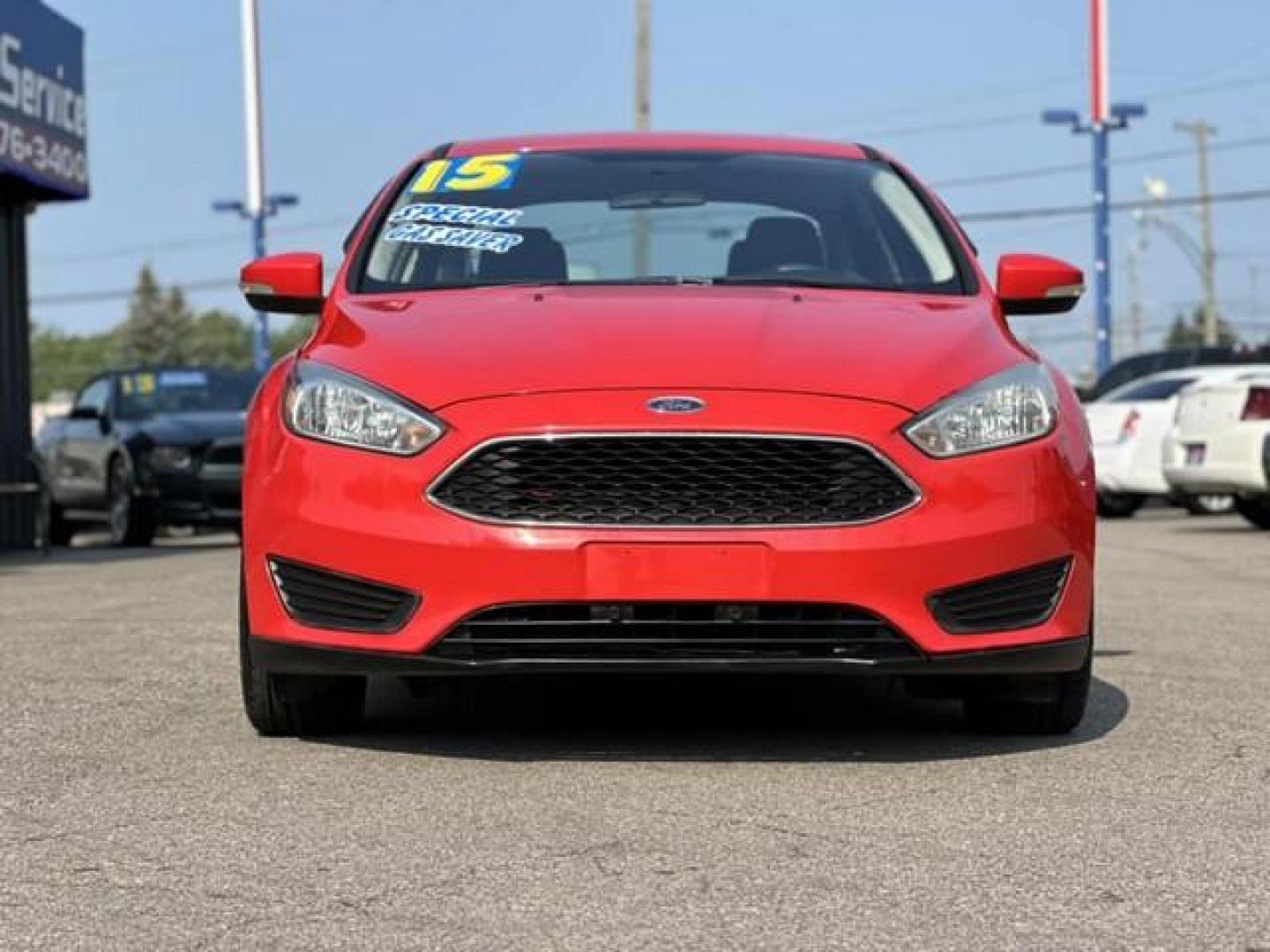 2015 RED FORD FOCUS (1FADP3F24FL) with an L4,2.0L(122 CID),DOHC engine, AUTOMATIC transmission, located at 14600 Frazho Road, Warren, MI, 48089, (586) 776-3400, 42.485996, -82.974220 - Photo#1