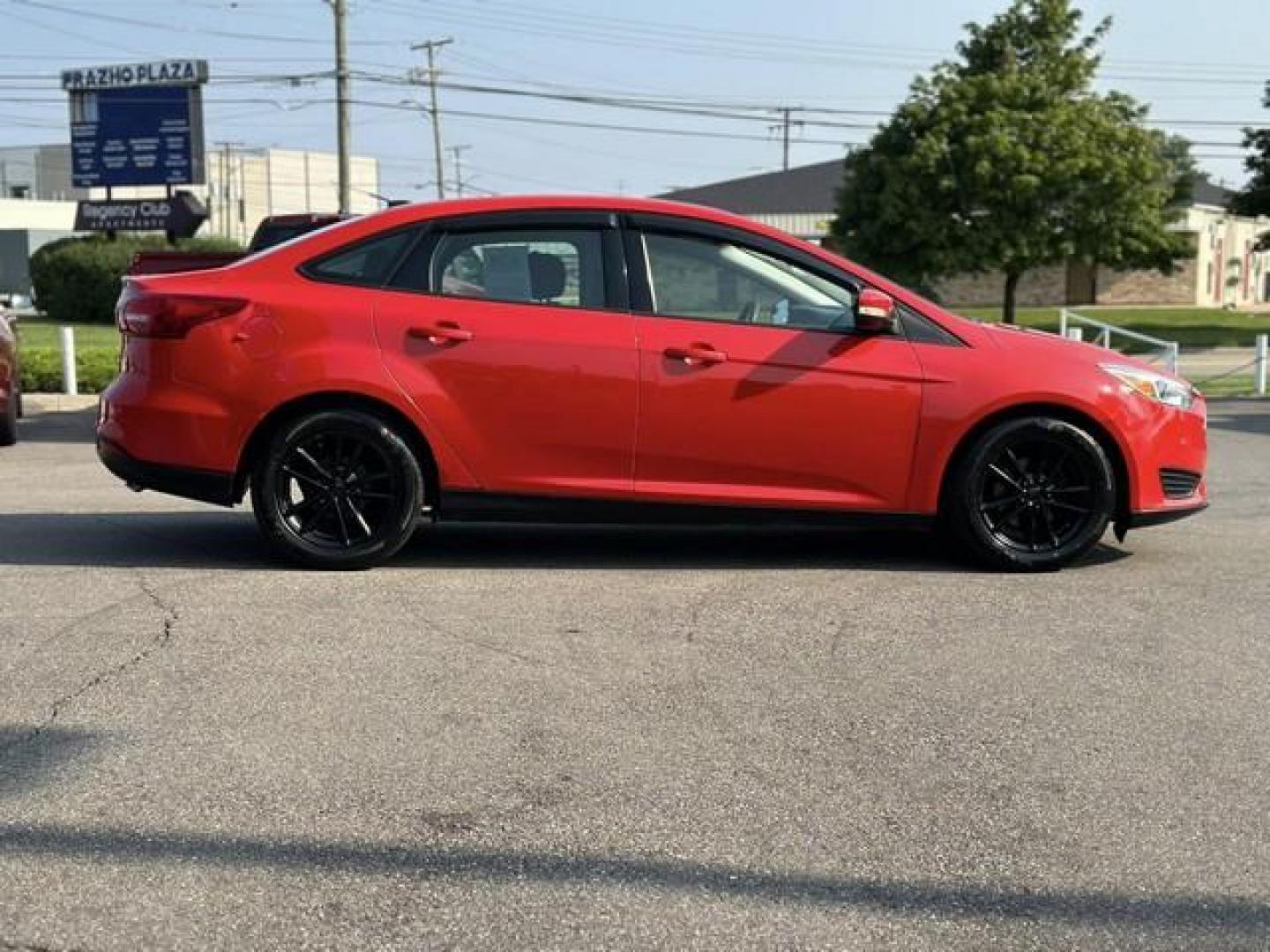 2015 RED FORD FOCUS (1FADP3F24FL) with an L4,2.0L(122 CID),DOHC engine, AUTOMATIC transmission, located at 14600 Frazho Road, Warren, MI, 48089, (586) 776-3400, 42.485996, -82.974220 - Photo#3