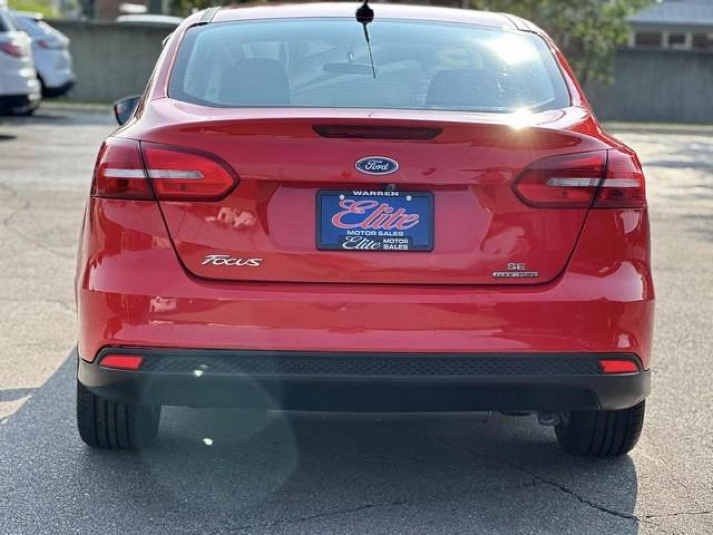 2015 RED FORD FOCUS (1FADP3F24FL) with an L4,2.0L(122 CID),DOHC engine, AUTOMATIC transmission, located at 14600 Frazho Road, Warren, MI, 48089, (586) 776-3400, 42.485996, -82.974220 - Photo#5