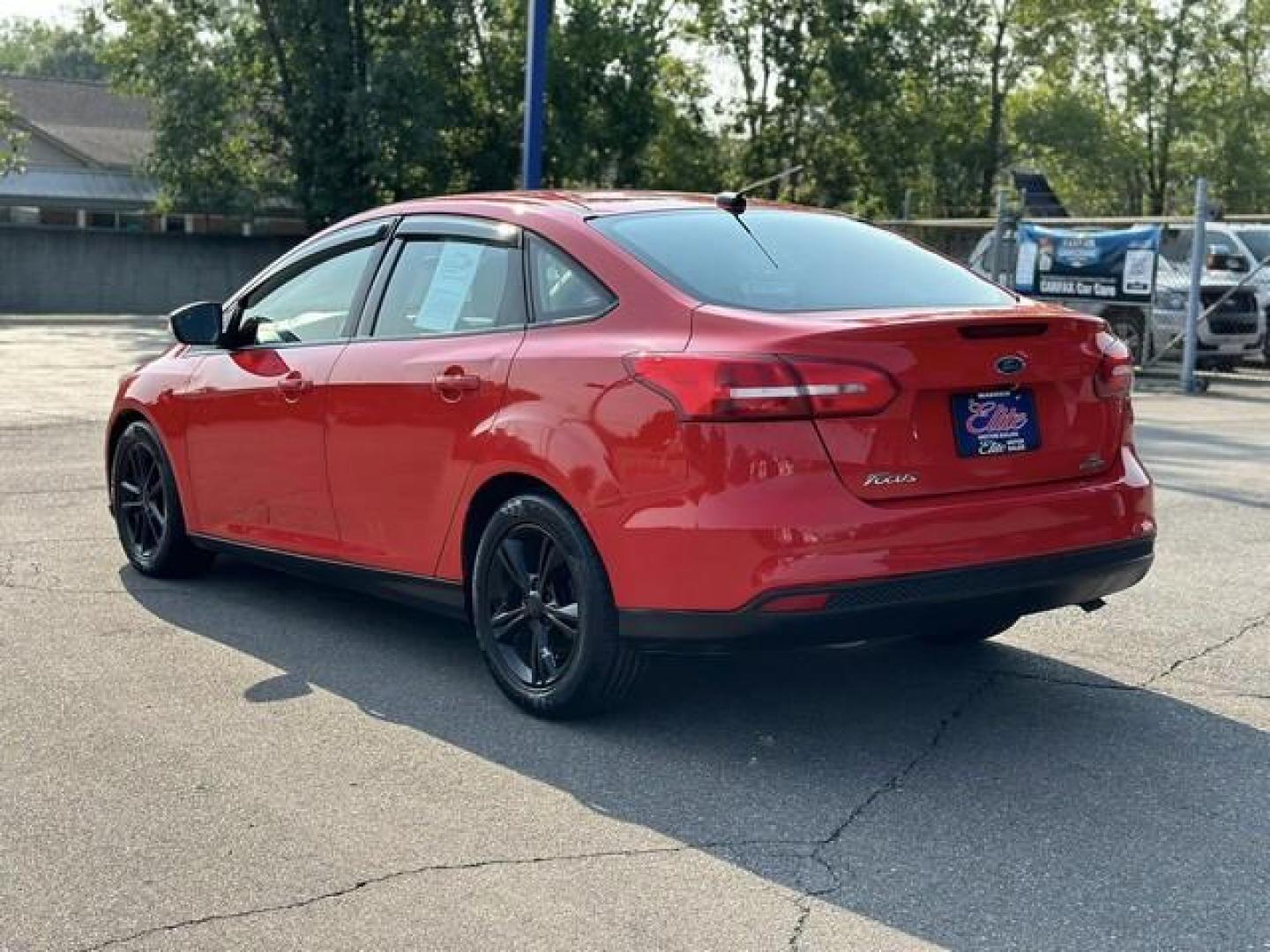 2015 RED FORD FOCUS (1FADP3F24FL) with an L4,2.0L(122 CID),DOHC engine, AUTOMATIC transmission, located at 14600 Frazho Road, Warren, MI, 48089, (586) 776-3400, 42.485996, -82.974220 - Photo#6