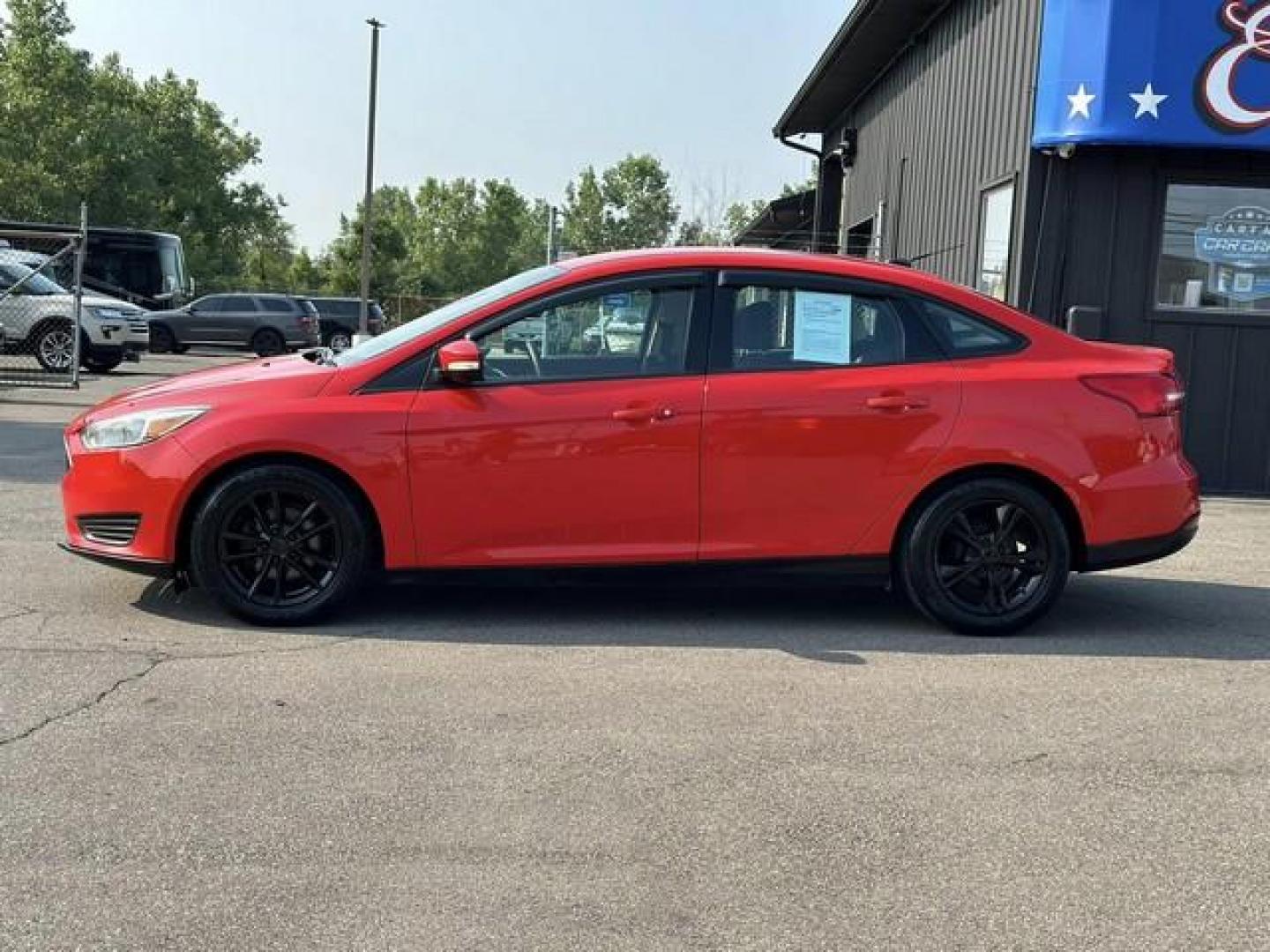 2015 RED FORD FOCUS (1FADP3F24FL) with an L4,2.0L(122 CID),DOHC engine, AUTOMATIC transmission, located at 14600 Frazho Road, Warren, MI, 48089, (586) 776-3400, 42.485996, -82.974220 - Photo#7