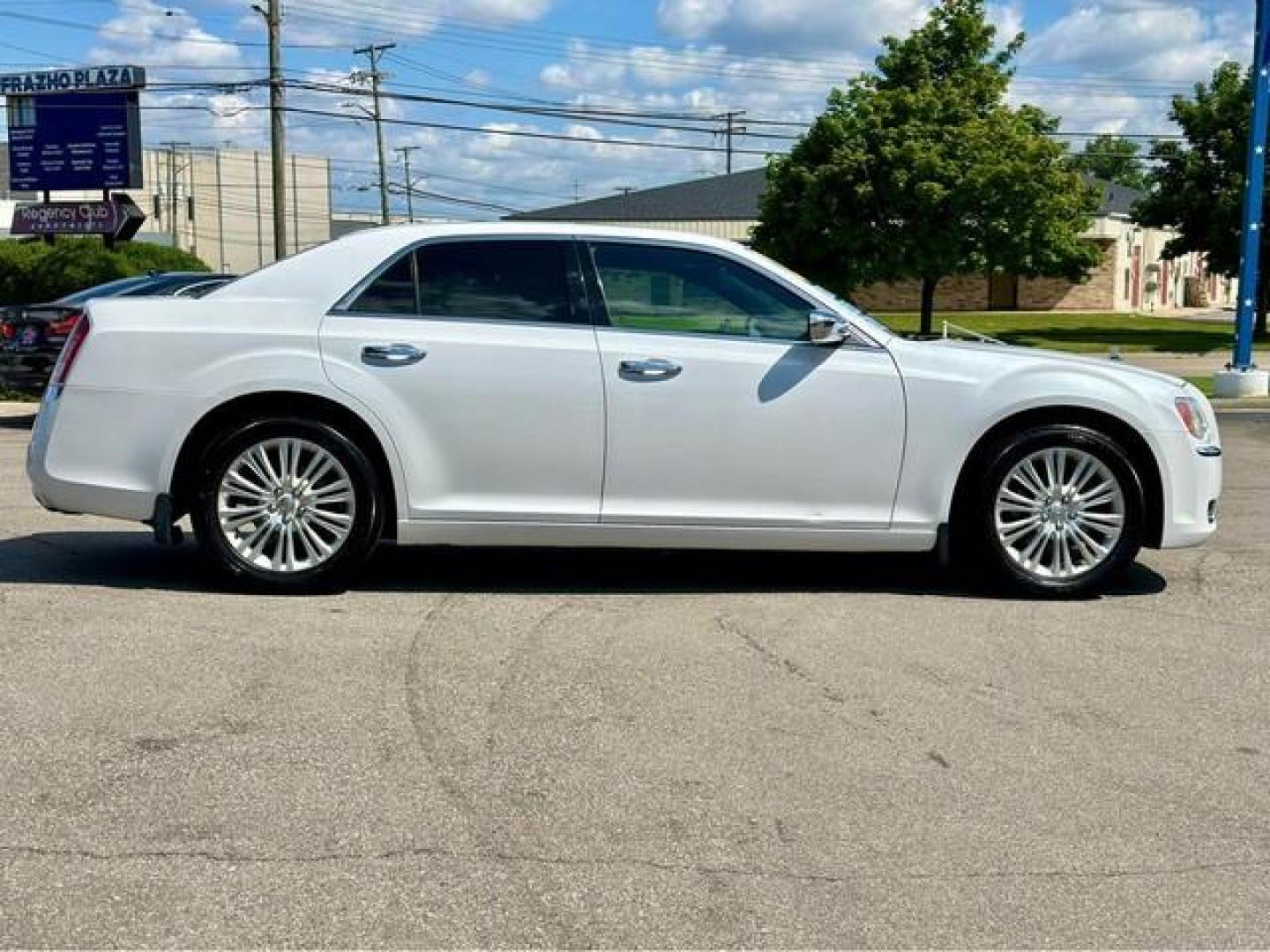 2012 WHITE CHRYSLER 300 (2C3CCAHG3CH) with an V6,3.6L(220 CID),DOHC engine, AUTOMATIC transmission, located at 14600 Frazho Road, Warren, MI, 48089, (586) 776-3400, 42.485996, -82.974220 - Photo#3