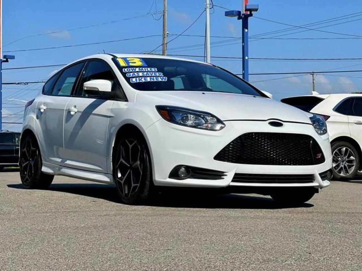 2013 OXFORD WHITE FORD FOCUS (1FADP3L94DL) with an L4,2.0L(122 CID),DOHC engine, MANUAL transmission, located at 14600 Frazho Road, Warren, MI, 48089, (586) 776-3400, 42.485996, -82.974220 - Photo#13