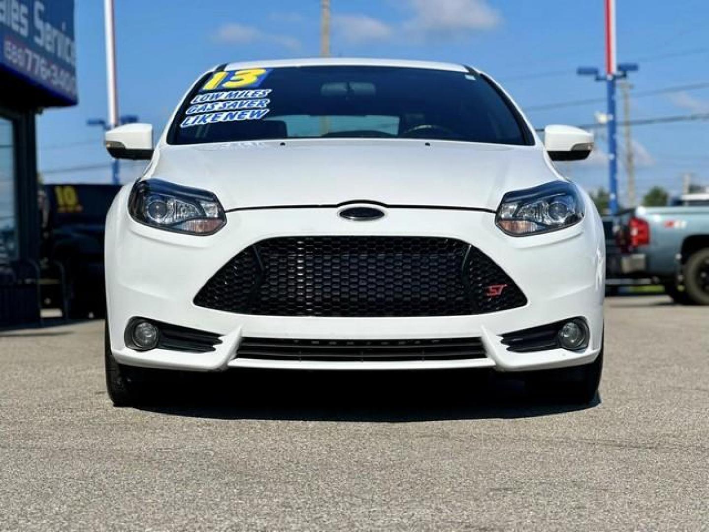 2013 OXFORD WHITE FORD FOCUS (1FADP3L94DL) with an L4,2.0L(122 CID),DOHC engine, MANUAL transmission, located at 14600 Frazho Road, Warren, MI, 48089, (586) 776-3400, 42.485996, -82.974220 - Photo#1