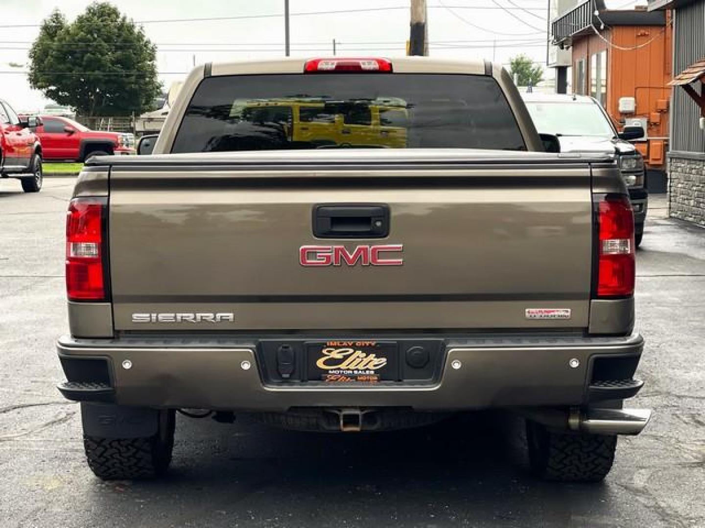 2015 BROWN GMC SIERRA 1500 (3GTU2UEC0FG) with an V8,5.3L(325 CID),OHV engine, AUTOMATIC transmission, located at 14600 Frazho Road, Warren, MI, 48089, (586) 776-3400, 42.485996, -82.974220 - Photo#4