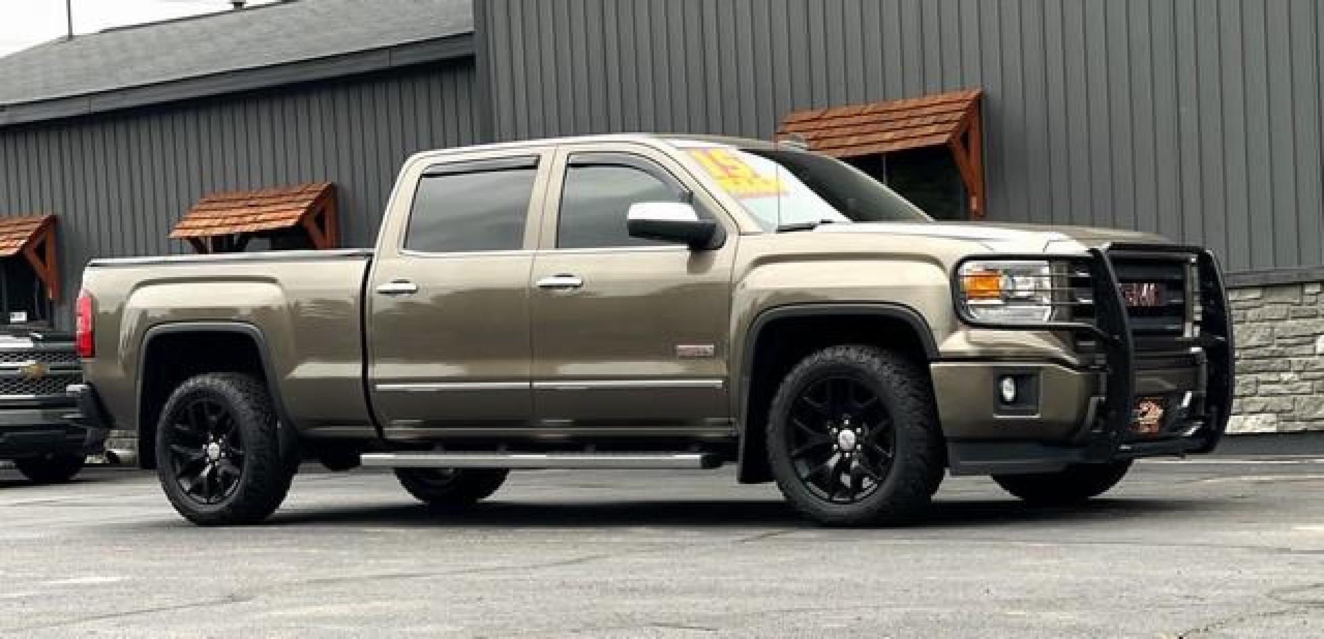 2015 BROWN GMC SIERRA 1500 (3GTU2UEC0FG) with an V8,5.3L(325 CID),OHV engine, AUTOMATIC transmission, located at 14600 Frazho Road, Warren, MI, 48089, (586) 776-3400, 42.485996, -82.974220 - Photo#5